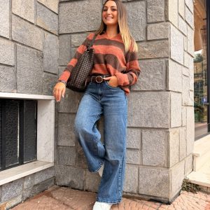 Jeans gamba larga con cintura